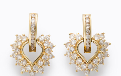 A pair of diamond and fourteen karat gold earrings