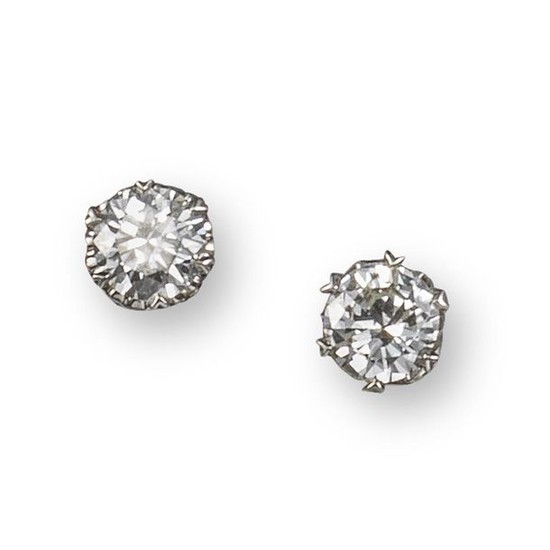 A pair of diamond stud earrings, the circular-cut...