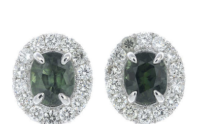 A pair of green sapphire and brilliant-cut diamond cluster earrings.