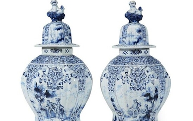 A pair of large Dutch Delft lidded jars, 18th century