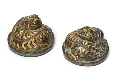 A rare pair of Chinese bronze and inlaid 'tiger' mat...
