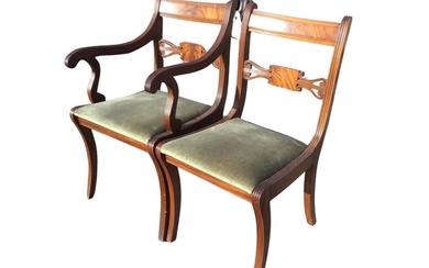 A regency style mahogany armchair with rectangular back and lyre...