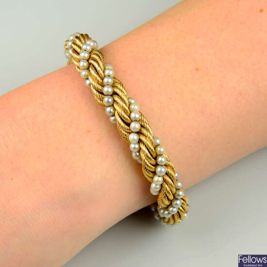 A seed pearl rope-twist bracelet.