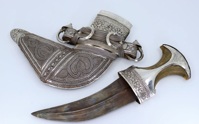 A silver Omani Jambiya dagger having horn hilt, ornate...
