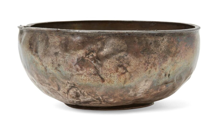 A silver bowl, possibly Sasanian, of deep form with flat base and rounded sides, 12.2cm. diam. x 4.5cm. deep Provenance: Private Collection Oliver Hoare (1945-2018); Sotheby's New York 31 May 1997, Lot ???