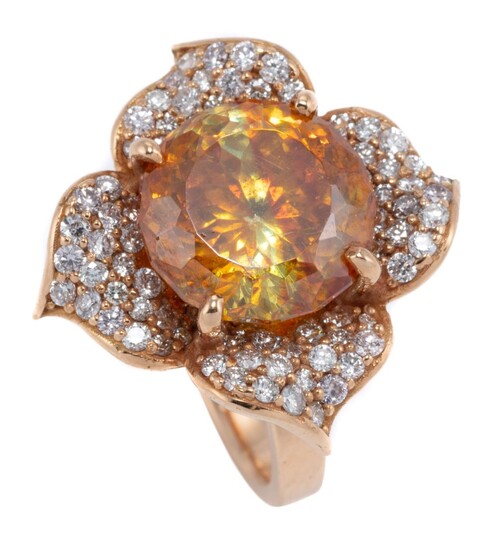 AN 18CT ROSE GOLD DIAMOND AND GEMSET DAISY RING; centring an approx. 10ct round cut sphalerite surrounded by 4 petals set with round...