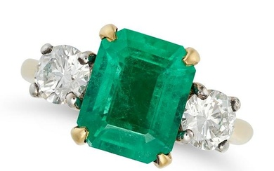 AN EMERALD AND DIAMOND THREE STONE RING in 18ct yellow gold, set with an octagonal step cut emera...