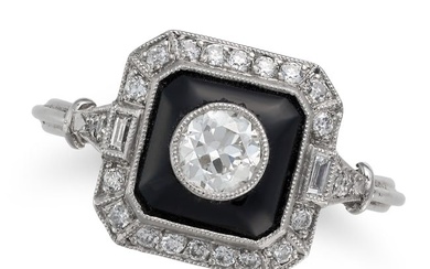 AN ONYX AND DIAMOND DRESS RING comprising a polished onyx set with a round brilliant cut diamond in