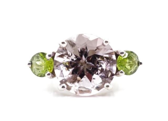 Amethyst and peridot set 9ct white gold ring in the cocktail...