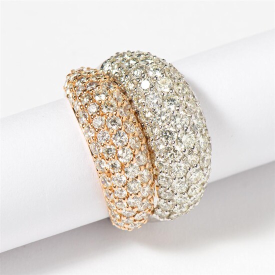 (-), An 18 carat white and red gold...