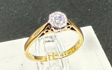 An 18ct yellow gold and platinum set diamond ring, approxima...