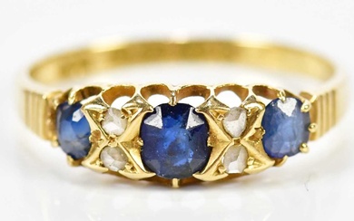 An 18ct yellow gold sapphire and diamond ring with three...
