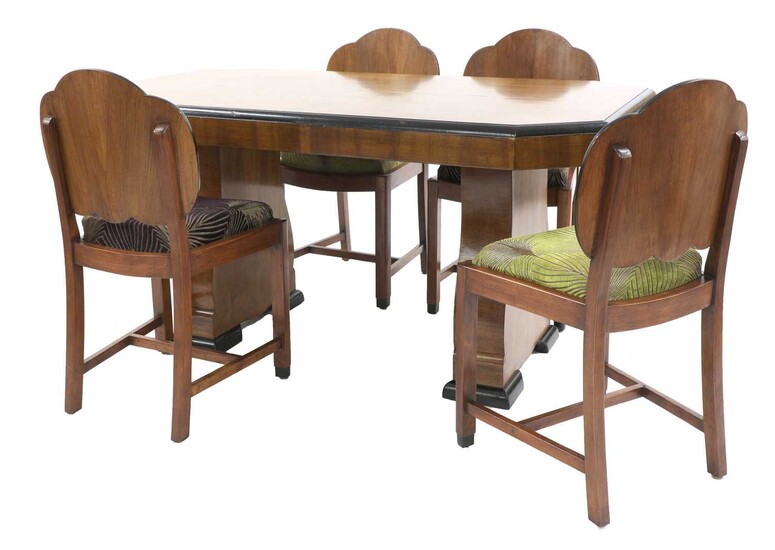 An Art Deco walnut dining table