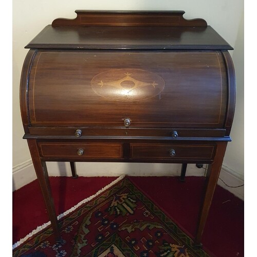 An Edwardian Mahogany Inlaid Cylinder Desk with pull out fro...