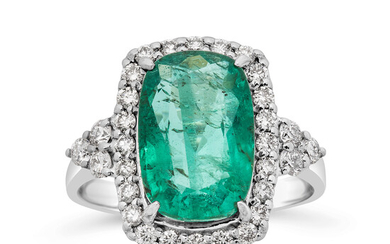 An Emerald, Diamond and White Gold Ring