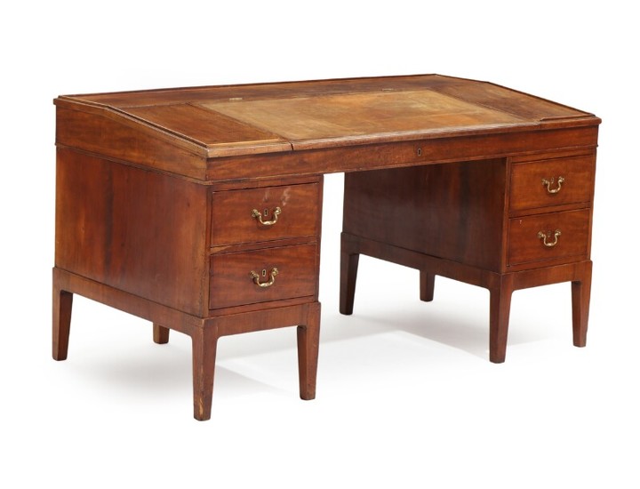 An English 19th century brass mounted mahogany desk, top partly covered with patinated leather, front with four drawers. H. 83. W. 158. D. 80 cm.