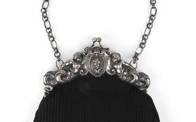 An Italian fabric handbag with silver handle - Crivelli...