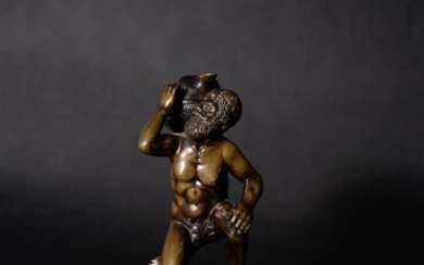 An Italian patinated bronze figural inkwell with Atlas supporting the globe
