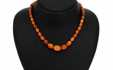 SOLD. An amber necklace set with numerous polished amber beads. L. app. 43 cm. Largest...
