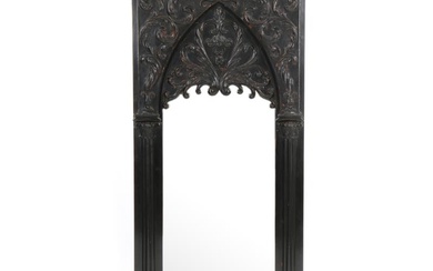 An ebonized Karl Johan mirror. Sweden, c. 1820. H. 165 cm. W....