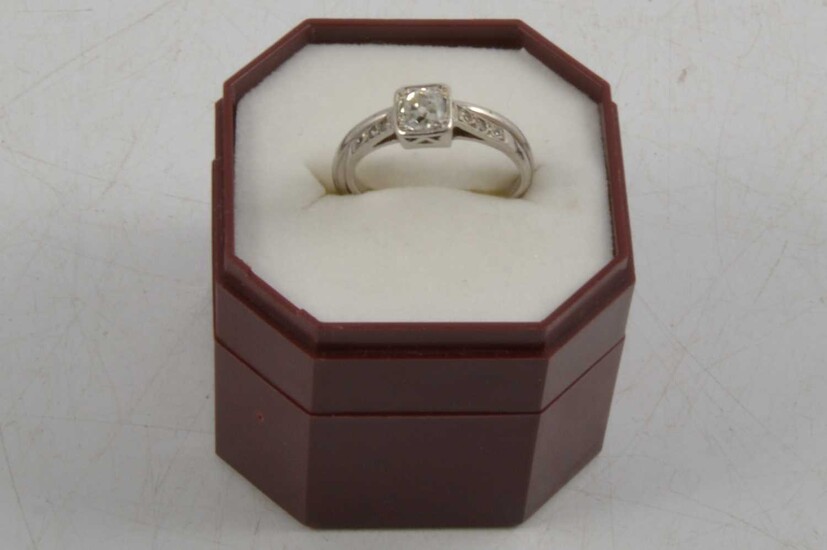 An old cut diamond ring and a wedding ring.