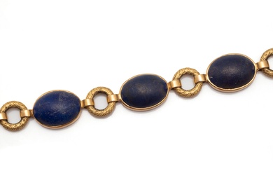 Bracelet articulé en or 750 millièmes, orné de 5 cabochons de lapis lazuli dépoli en...