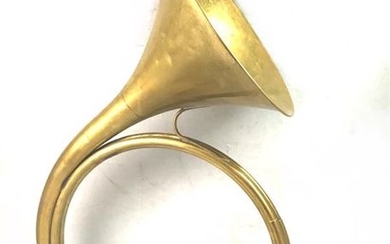 COUESNON in Paris. Brass hunting horn with three...