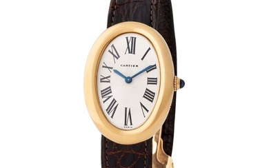 Cartier Paris. Elegant Baignoire Oval-Shape Wristwatch in Yellow Gold, With Silver Roman Numbers Dial