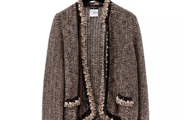 Chanel: A set consisting of a jacket and a skirt made of tweed in beige, brown and black colors. Size 40 (FR)