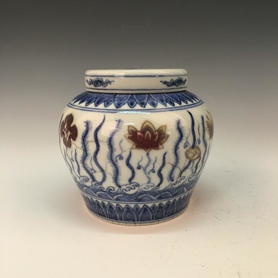 Chinese Blue-White 'Lotus' Copper Red Jar and Cover