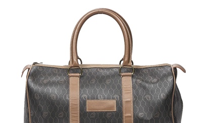 Christian Dior A travel bag of black monogram canvas with brown leather...