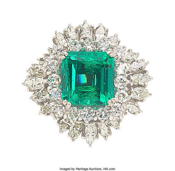 Colombian Emerald, Diamond, White Gold Ring The ring...
