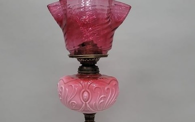 Dated 1877 Pinkish Oil Banquet Lamp with Antique ruffled glass shade. Hgt 32" dia. 7.5". All glass