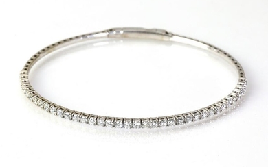 Diamond and 14k flexible oval line bracelet