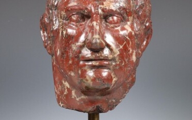 Een rood marmeren buste van een Romeinse Keizer, 20e eeuw;...