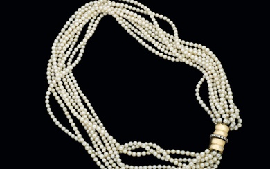 Eight string pearl necklace with diamonds