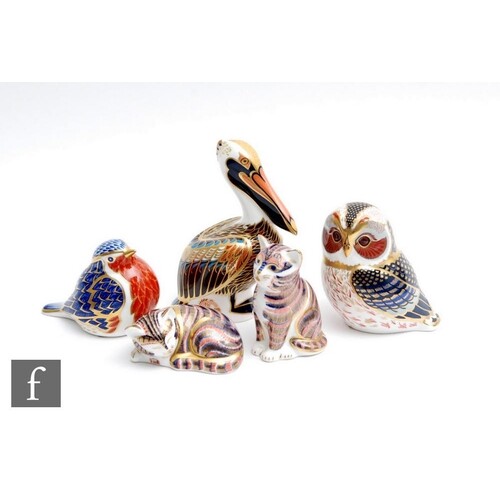 Five assorted Royal Crown Derby paperweights comprising a Br...