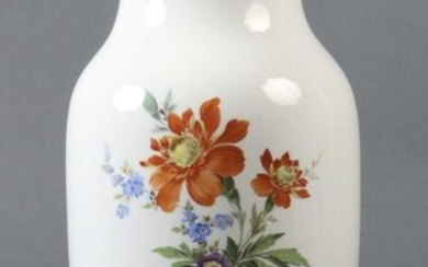 Floor vase Meissen, 1961, porcelain, glazed, frontal bouquet of flowers and on the back two scattered flowers in polychrome onglaze painting, gold rim, baluster form with round stand, slightly bulging walls, neck indented and slightly flared mouth...