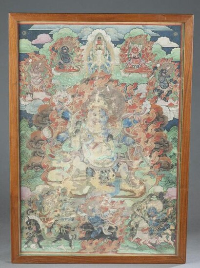 Framed Tibetan thanka painting.