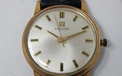 Gent's 9ct Gold Tissot wristwatch with a leather strap