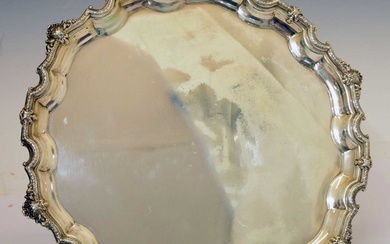 George V silver salver with decorative pie crust edge