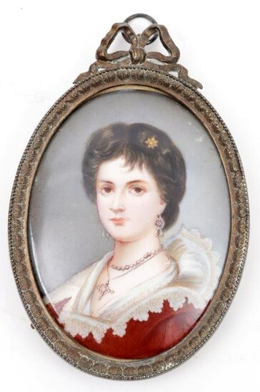Hand-painted portrait miniature in oval bow frame