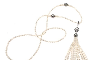 Hartmann's: A hinged pearl and diamond pendant set with numerous pearls and black diamonds and a necklace set with numerous pearls. L. 80 cm.