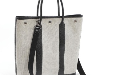 Hermès A “Garden File” bag of light canvas and black leather with...