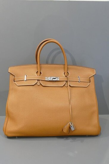 Hermès bag Birkin 40 model in Clémence Gold Taurillon leather with saddle stitching and silver plated metal trim (year 2012) with cover