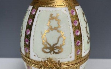 IMPERIAL FABERGE LIMOGE PORCELAIN AND SILVER EGG