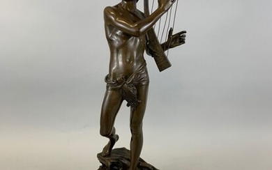 Jean-Baptiste GERMAIN (1841-1910) "David jouant de la harpe" Bronze à patine brun nuancé. Contresocle de...