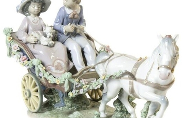 Lladro porcelain sculpture of couple in horse drawn