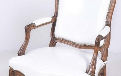 Louis XV style carved walnut open armchair