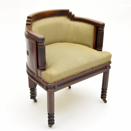 Mahogany desk-chair with rounded backrest, the seat upholstered, designer &...